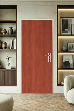 Fichet Spheris S lisa en acabado cerezo, con manilla cromada, en un salón con estanterías